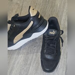 Puma Womend Black and Gold Sneakers